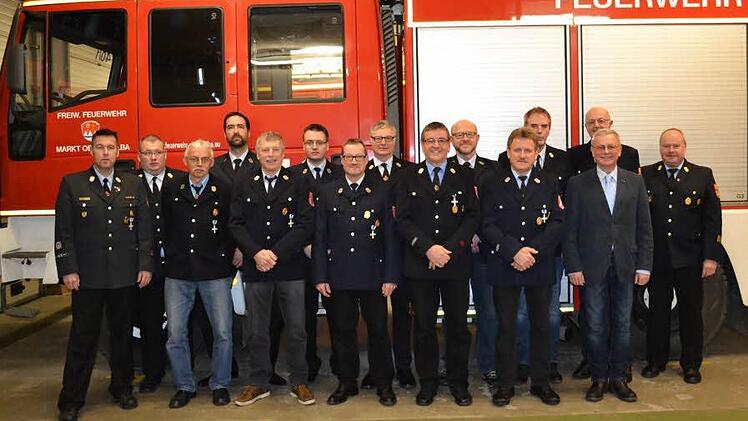 Gruppenbild der geehrten Feuerwehrleute.  Foto: Nicolas Thoma