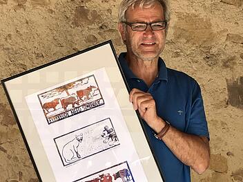 Georg "Schorsch" Neutzner präsentiert seine drei Linoldruckmotive im  Gasthaus Sponsel. Foto: Thomas Weichert
