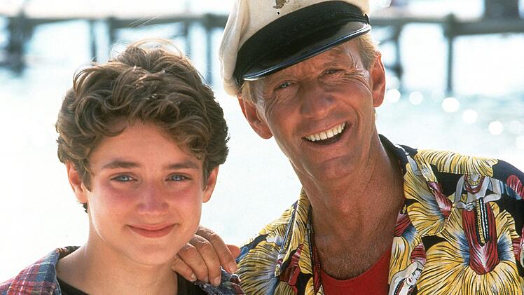 Die weitere Karriere von Paul Hogan (Bild rechts, mit Elijah Wood) verlief nicht sonderlich erfolgreich: Nicht nur das Remake von "Flipper" (1996) floppte kl&auml;glich.