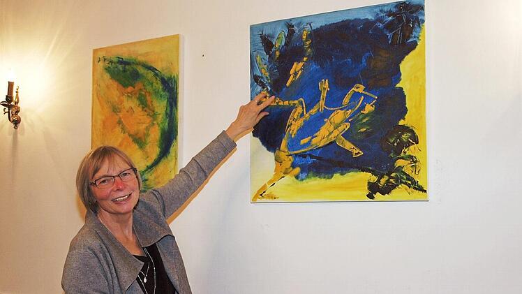 Claudia Scheler hat hier mit Acrylfarbe auf Leinwand den Augenblick des Sprungs eines Frosches in einen Teich festgehalten.  Foto: Alfred Thieret
