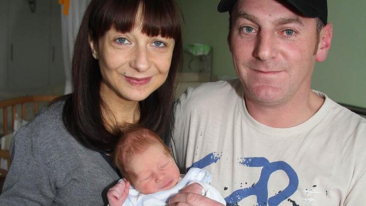 Ab jetzt zu dritt: Katja und Heiko Marschaleck mit Sohn Robin. Foto: Adam