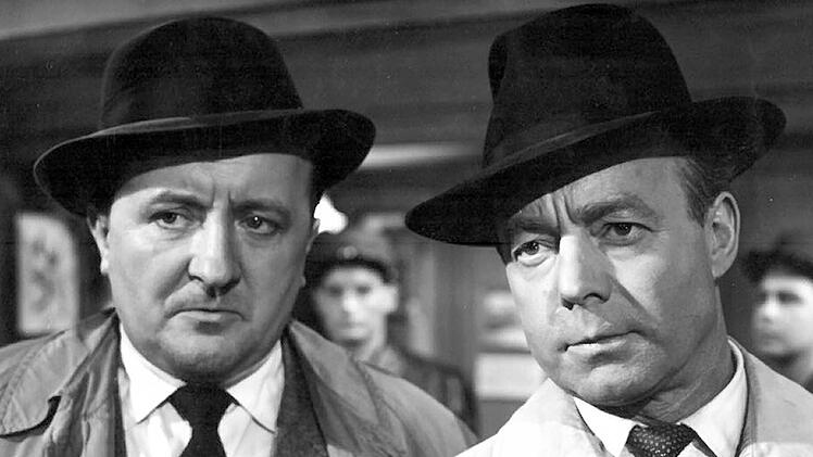 In "Es geschah am hellichten Tag" (1958) spielte Siegfried Lowitz (links) an der Seite von Heinz R&uuml;hmann.