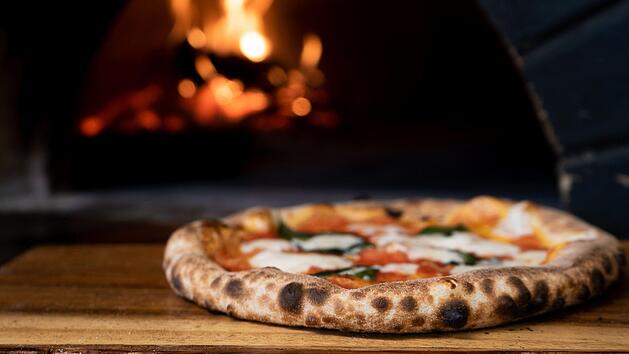 Pizza wird ganz anderst gegessen, als wir das für üblich machen. Nik Owens/ Unsplash