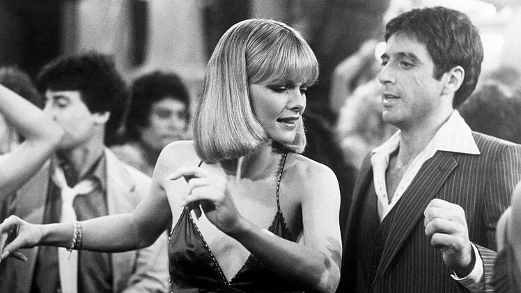 Spätestens mit "Scarface" reifte Michelle Pfeiffer (Bild, mit Hauptdarsteller Al Pacino) zur ernstzunehmenden Schauspielerin heran.