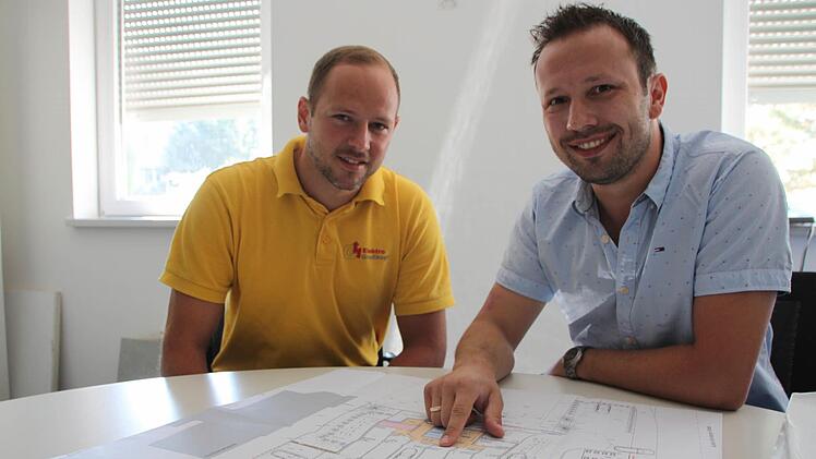 Die Bauherren Marc Großkopf (links) und Florian Erlwein.
