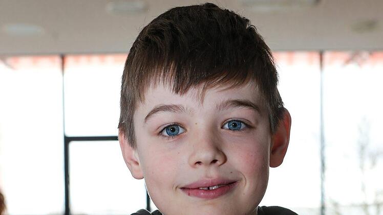Jonathan (8)  aus Ebing: "Ich habe einen Opa gemalt. Es sollte  erst ein Popel werden - den mag ich am liebsten. Aber der Opa ist auch gut geworden. Das hat Spaß gemacht!"  Foto: Matthias Hoch