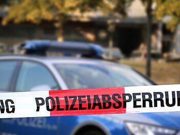 Cordon tape with the word &acirc;&euro;žPolizeiabsperrung&acirc;&euro;&oelig;, the german word for police cordon
