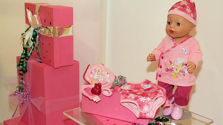 Rosa ist die prägende Farbe am Zapf-Messestand. Foto: Berthold Köhler