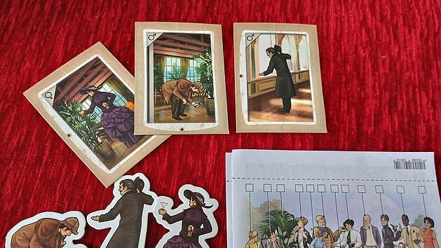 Spiele-Test "Der Perfekte Moment - Die Sherlock-Erweiterung": Fotopuzzle mit Krimi-Story