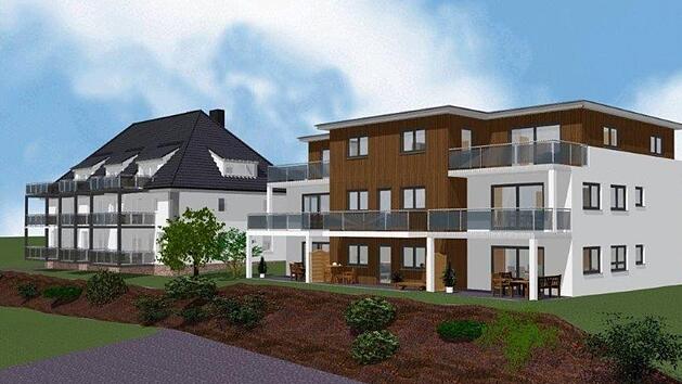 Das neue Wohnprojekt in Burkardroth steht neben der alten Schule am Kirchberg. Rechts zeigt die Visualisierung den geplanten Neubau, links daneben die alte Schule. Foto: Wolf-Haus