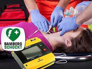 Ein Bild der Kampagne "Bamberg schockt": Solche Defibrillatoren sollen in Stadt und Kreis Bamberg Erste Hilfe erleichtern.  Foto: Shutterstock/Bamberg schockt