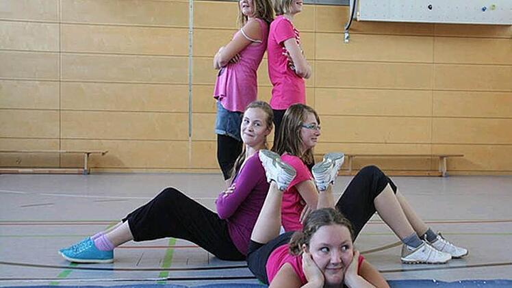 Bei der Ganztagsbetreuung wird den Kindern nicht nur Essen und Unterricht geboten. Sie können auch kreativ sein oder tanzen und Sport treiben.