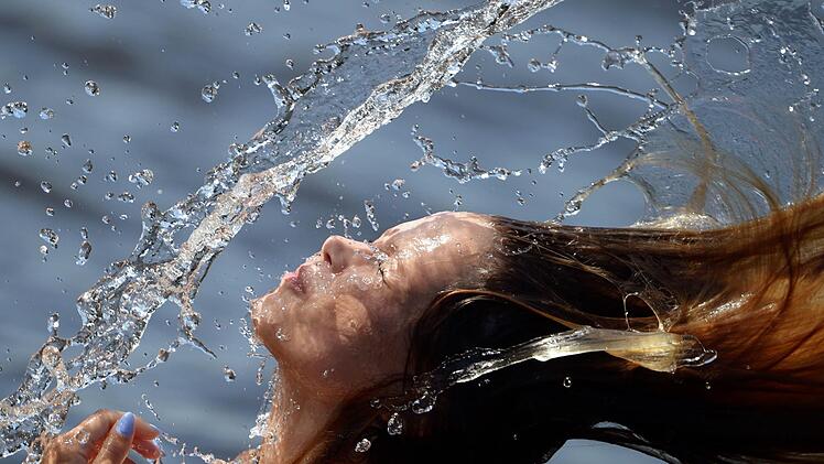 Am Mittwoch werden bis zu 32 Grad erwartet. Dann kommen Gewitter und ein starker Temperaturabsturz. Symbolfoto: Ralf Hirschberger/dpa