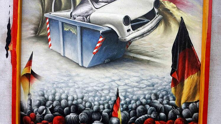 Nach dem Mauerfall 1989 hat Werner Götz das Ölbild "Hurra, Deutschland" gemalt. Für die Ausstellung hat er es aktuell ergänzt. Foto: Wolfgang Schoberth