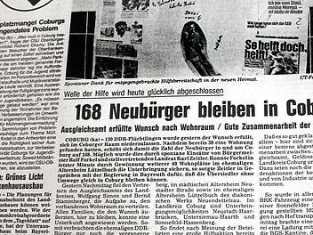 Das Tageblatt vom 4. Oktober 1990: Auf einem Plakat dankten die Flüchtlinge aus der DDR den Coburgern für ihre spontane Hilfe.  Repro: C. Lehmann
