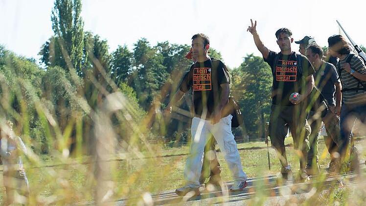 Flüchtlinge protestieren mit einem Marsch von Würzburg nach Berlin gegen die deutsche Asylpolitik. Foto: Tobias Köpplinger