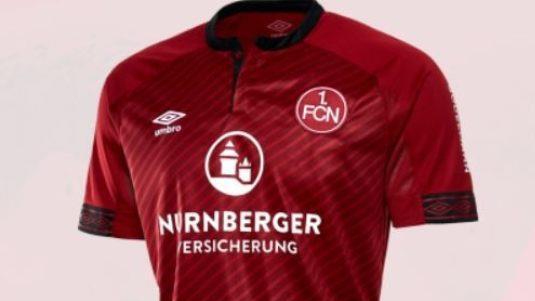 Der 1. FC N&uuml;rnberg hat zum Wochenstart sein neues Heimtrikot ver&ouml;ffentlicht. In der kommenden Spielzeit l&auml;uft der Club im klassischen sowie schlichten Design auf.  Foto: Screenshot/FCN-Fanshop/fcn-fan-shop.de
