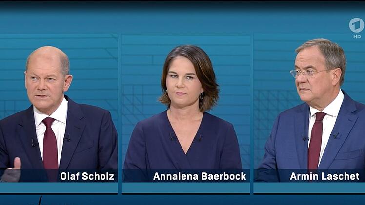Viele Millionen Menschen sahen sich die drei Politiker Olaf Scholz, Annalena Baerbock und Armin Laschet im Fernsehen an.