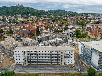 Der neue Stadtteil aus der Vogelperspektive; vorne rechts das neue Parkhaus der HUK.