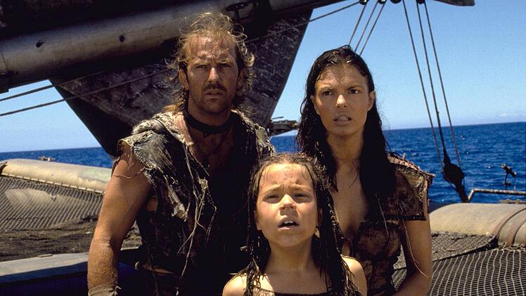 Helen (Jeanne Tripplehorn) befreit den Mutanten Mariner (Kevin Costner) und fl&uuml;chtet mit ihm und der kleinen Enola (Tina Majorino).