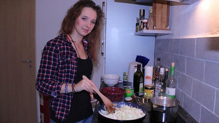 Amy Popadinets beim Kochen