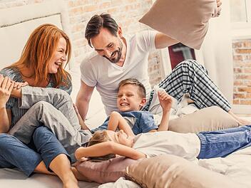 Young family being playful at home
