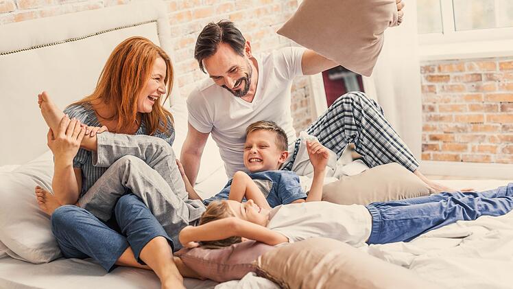 Young family being playful at home