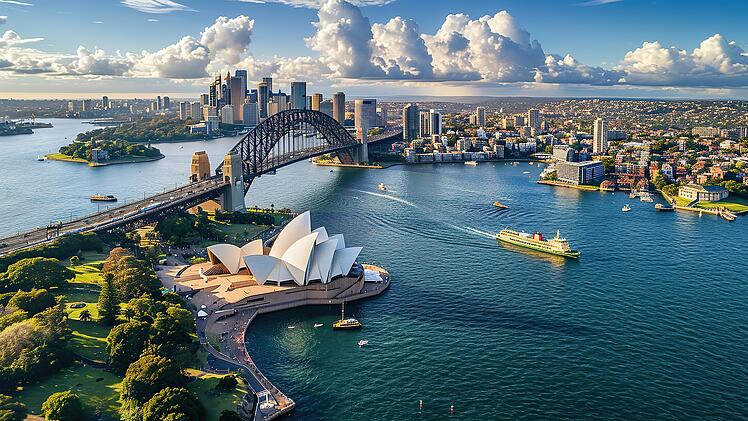 Sydney Harbour Bridge in a beautiful summer day, Australia, Sydney, Australia. Landscape aerial view of Sydney Opera house near Sydney business center.