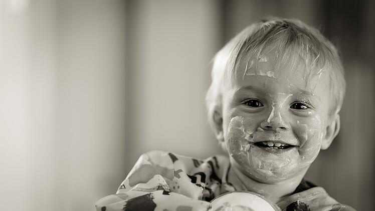 Kind mit Pudding
