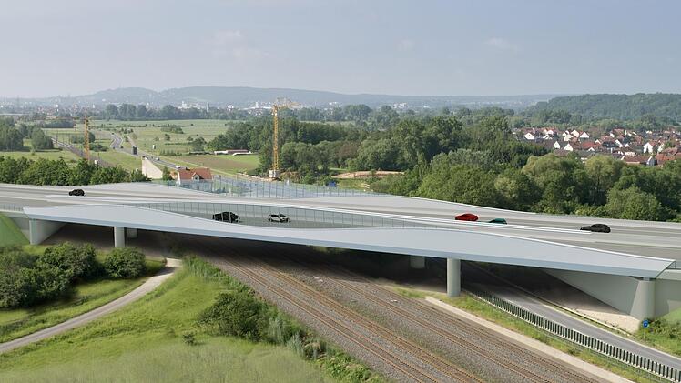 Vor allem die wellenförmige Gestaltung der neuen Brücke der A73 bei Kemmern fällt ins Auge. Der Neubau wird wegen des ICE-Ausbaus fällig. Was auf dem Bild noch nicht eingezeichnet ist, sind die Schallschutzwände entlang der Bahngleise.  Foto: Ingenieurbüro LAP/Autobahndirektion Nordbayern