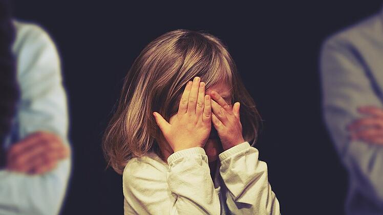Die Scheidung der Eltern ist für Kinder ein belastendes Erlebnis.