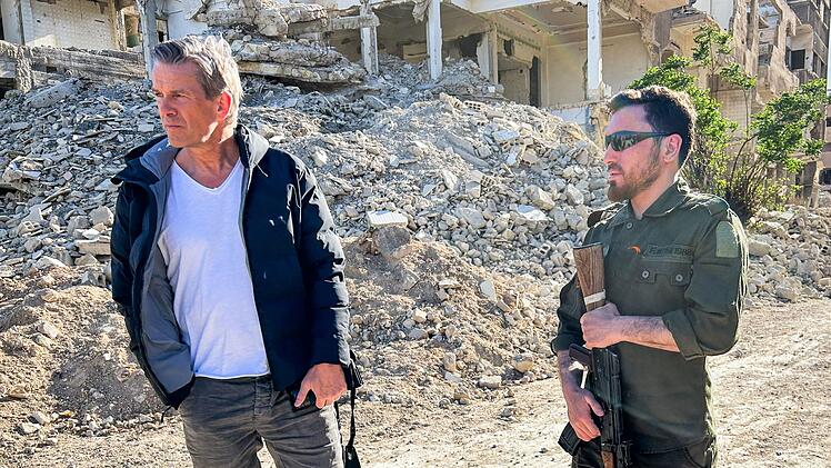 Bei seinem Besuch in Damaskus begegnet Markus Lanz (links) unvorstellbarem Leid und Zerstörung.