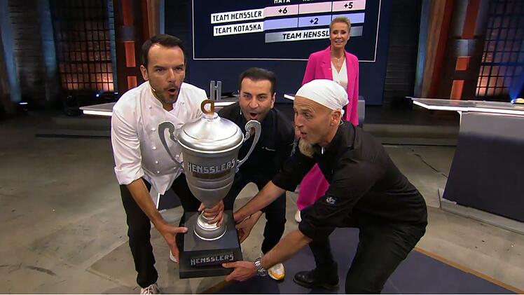 "So seh'n Sieger aus!" Team Henssler freute sich überschwänglich über den 96:87-Sieg und stemmte überglücklich den Pokal.