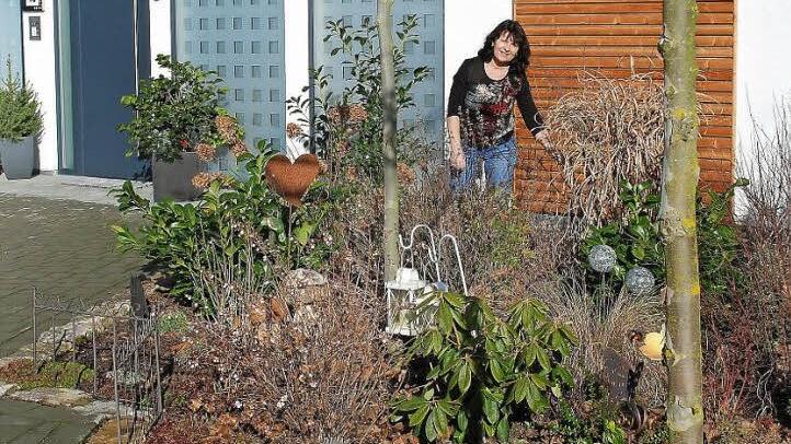 Ein Blickfang ist der Eingangsbereich des Anwesens der Familie Havlina. Brigitte und Dieter Havlina wurden bei der Hauptversammlung des Vereins der Garten- und Blumenfreunde Mainleus geehrt. Foto: Karl Klippel