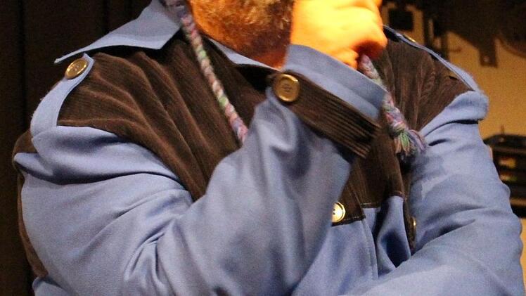 Wolfgang Buck (linkes Bild) und Stefan Kügel legten sich kräftig ins Zeug. Fotos: Evi Seeger