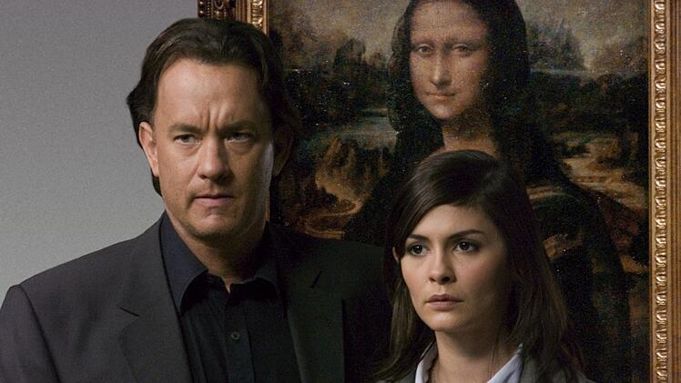 In der vor 20 Jahrene erschienenen Bestseller-Verfilmung "Der Da Vinci Code - Sakrileg" r&auml;tseln Tom Hanks und Audrey Tautou, welches Geheimnis die "Mona Lisa" verbirgt. Die Kritik zerriss den Film, und auch Hauptdarsteller Hanks h&auml;lt ihn f&uuml;r "Quatsch".