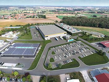 Amazon plant im Gewerbegebiet Limbach diese Logistikhalle. Die Visualisierung zeigt im Hintergrund den Pommersfeldener Ortsteil. Dort haben sich Kritiker des Projekts zu einer Bürgerinitiative zusammen geschlossen und einen Bürgerentscheid am 5. April erreicht. Visualisierung: P3 Logistic Parks