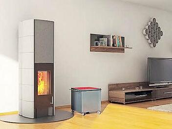 Eine attraktive Wärmequelle fürs Niedrigenergiehaus ist ein Speicherofen aus dem Tonwerk Lausen. Fotos: Tonwerk Lausen/HLC
