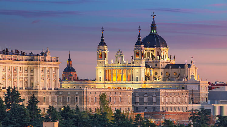 Madrid. Image of Madrid skyline with Santa Maria la Real de La Almudena Cathedral and the Royal Palace during sunset.