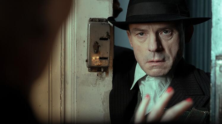 Der Witwenm&ouml;rder (Gerhard Liebmann) wird dem Publikum schon fr&uuml;h offenbart.