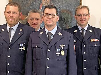 Von links: die Feuerwehrleute Stefan Leikheim, Hermann Schuberth, Markus Gampert und Tobias Winterbauer