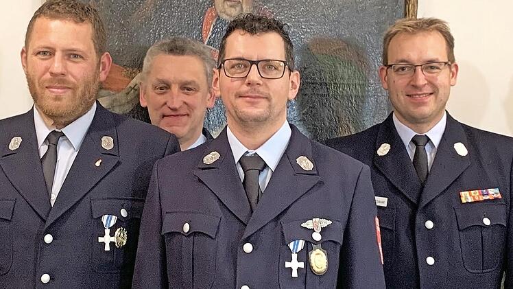 Von links: die Feuerwehrleute Stefan Leikheim, Hermann Schuberth, Markus Gampert und Tobias Winterbauer