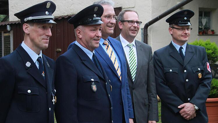 Gruppenbild mit Minister (von links): Karl-Heinz Nüsslein, Philipp Kropp, Joachim Herrmann, Christian Meißner und Bernhardt Gehringer
