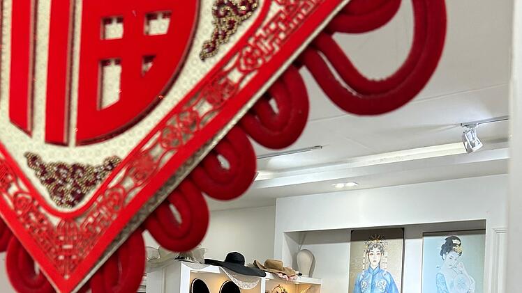 Fotografin "Kleine Chili" darf jeden Morgen und jeden Abend eine Kundin fotografieren.