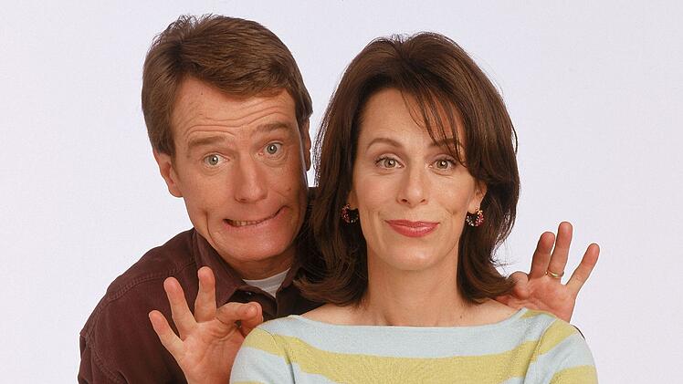 Seine erste gro&szlig;e Rolle: In der Sitcom "Malcolm mittendrin" spielte Bryan Cranston (Bild, Jane Kaczmarek) den leicht trotteligen Familienvater Hal.