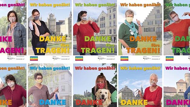Die Community-Masken, die von diesen ehrenamtlichen N&auml;herinnen hergestellt wurden, und andere Masken nat&uuml;rlich auch, sind vorhanden und sollten auch getragen werden. Darauf machen die Ehrenamtlichen nun bei einer Plakataktion aufmerksam.  Foto: Corinna R&ouml;sler