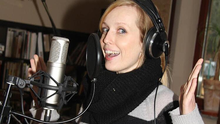 Christine Mühlenkamp ist die Sängerin und Frontfrau der Band "Christine set the scene". Sie hatte mitten im Sommer die Idee für den "Christmas Song" und freut sich über den Erfolg. Fotos: Sonja Adam