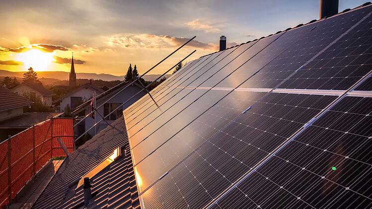Solar Panels Against Sky During Sunset