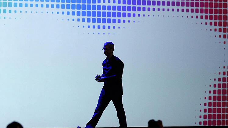Apple-Chef Tim Cook bei seinem Vortrag. Foto: John G. Mabanglo/dpa