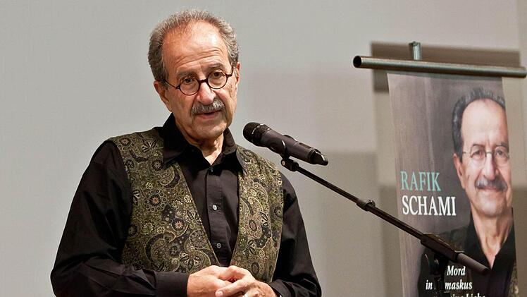 Rafik Schami bei seinem Auftritt im Pfarrsaal von St. Augustin.Foto: Jochen Berger